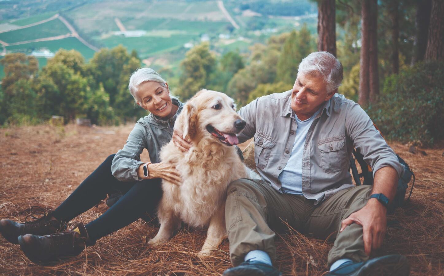 Mature couple with their dog
