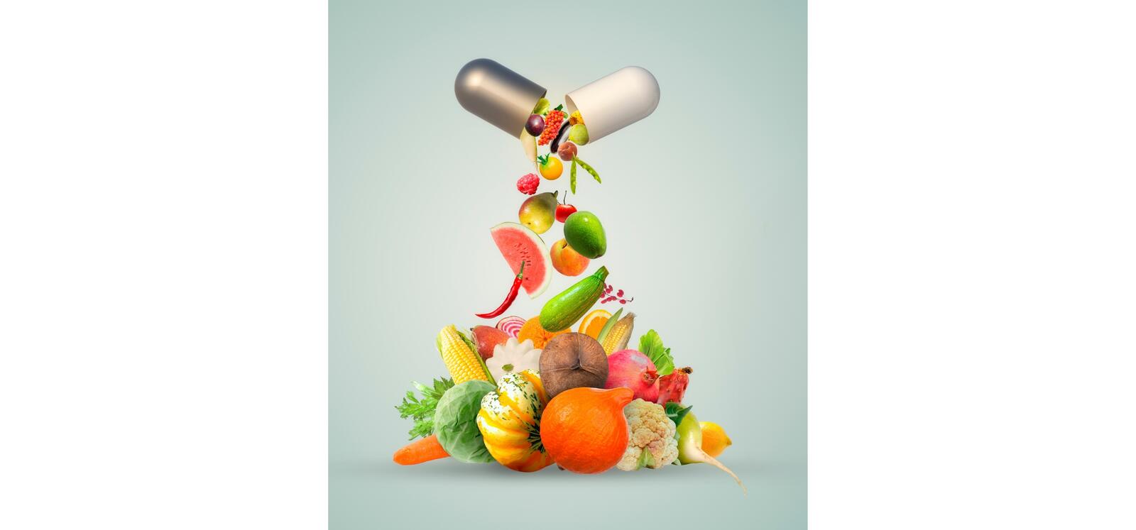 A slide of vegetables and fruits falling out of the capsule