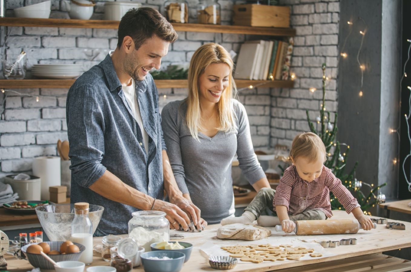 Family making holiday cookies