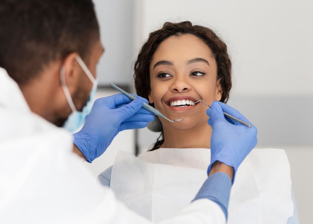 Woman receiving dental exam