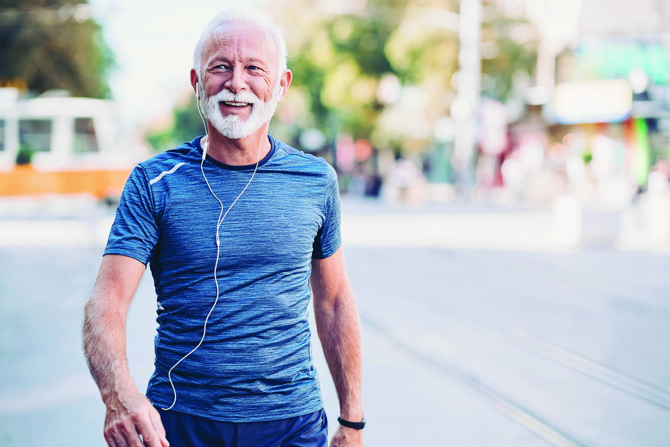 A man walking wearing blue shirt
