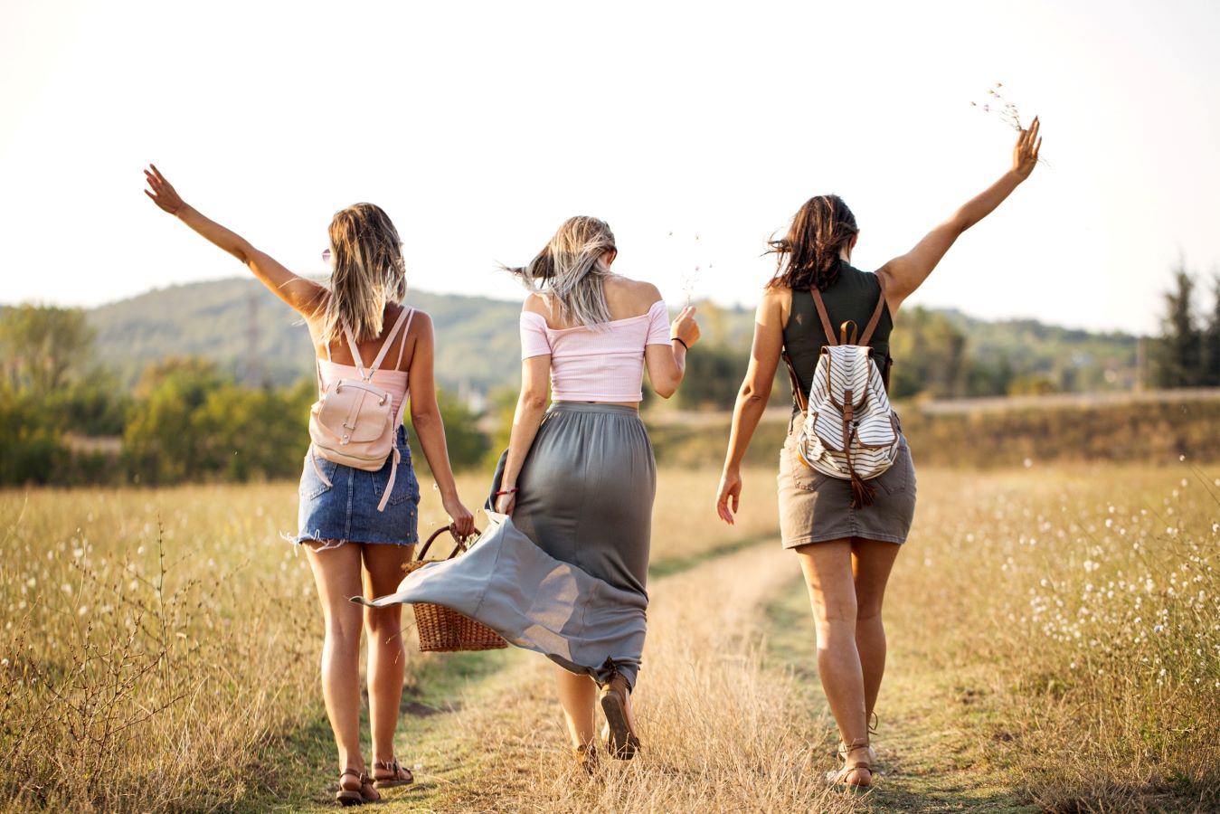 Three women walking without a care