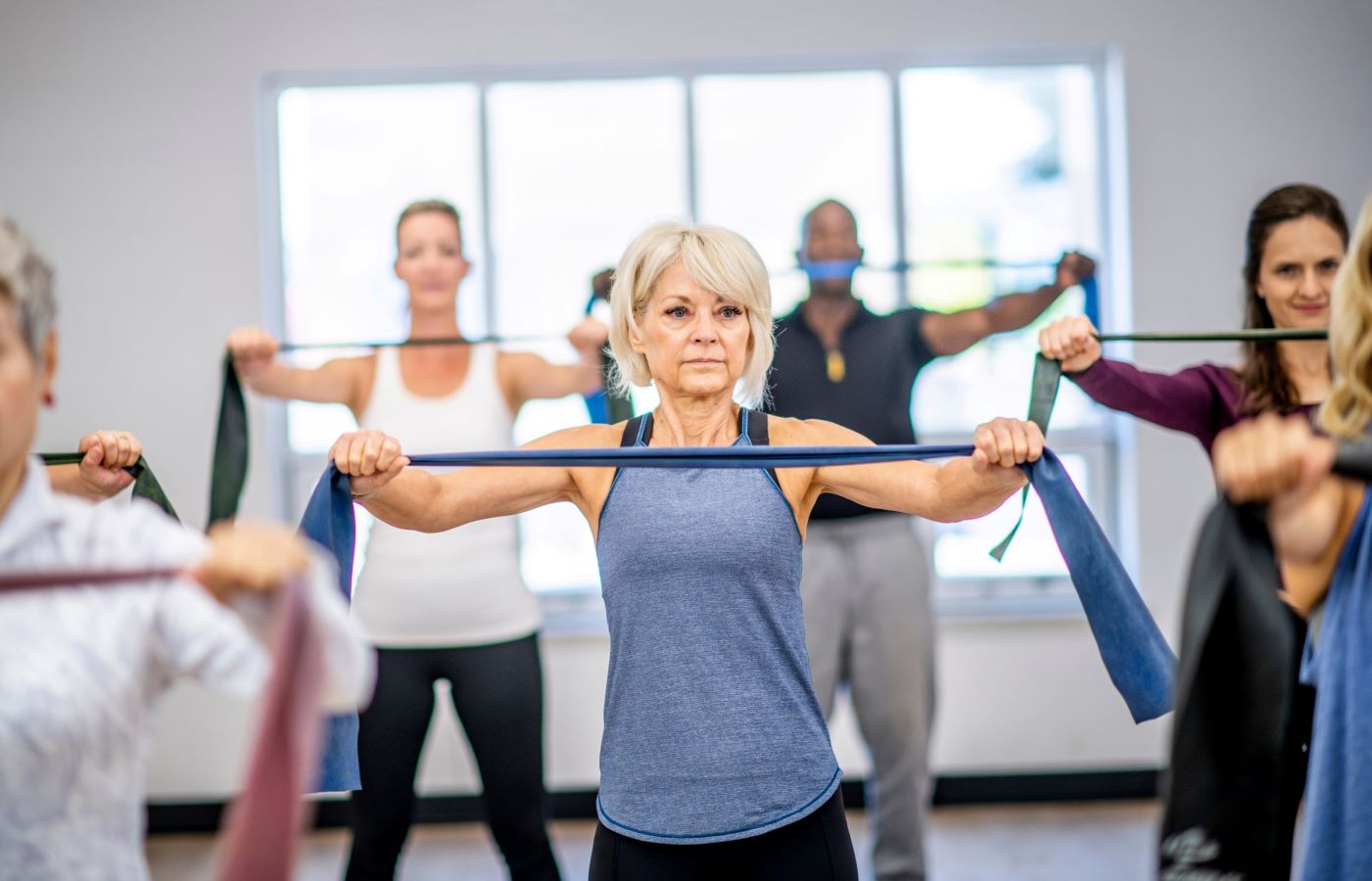 Woman doing resistance training in a class