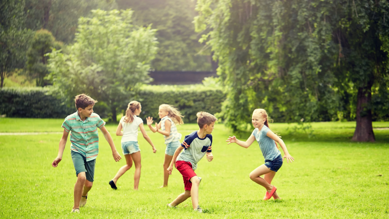 Group of children play outside