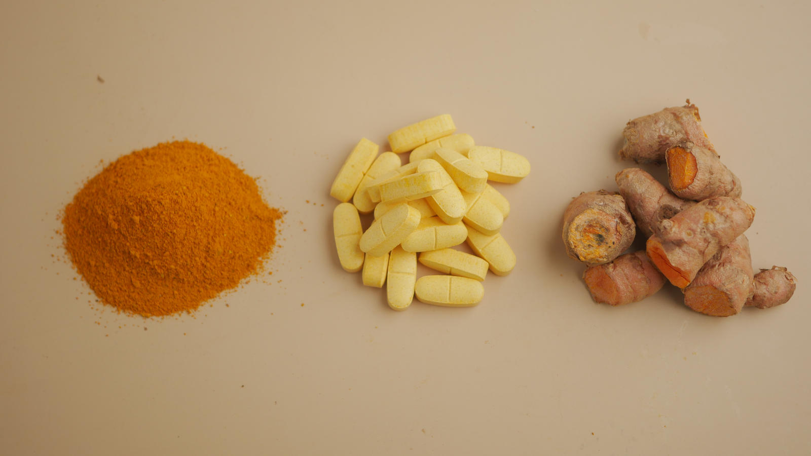 turmeric powder, supplement pills, and root