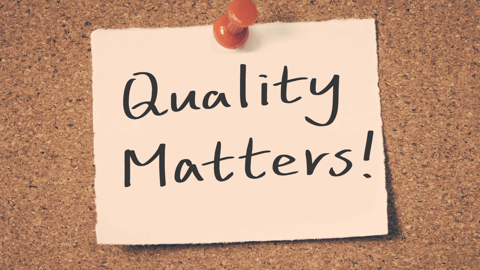 sticky note on corkboard that says "Quality Matters!"