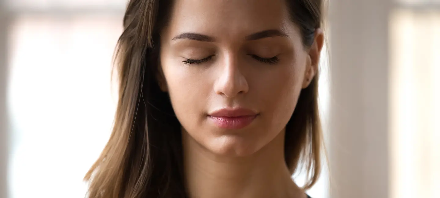 woman with close eyes and relaxing