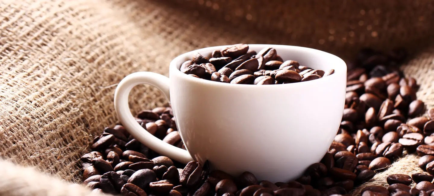 cup with coffee beans