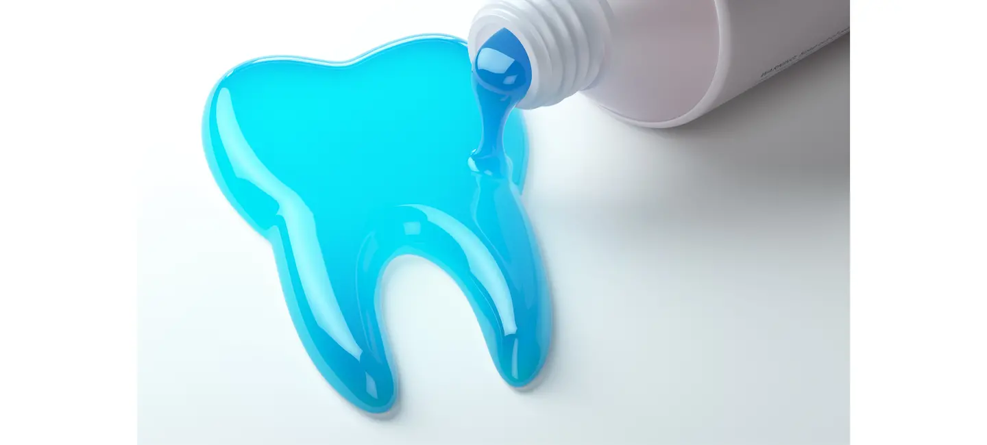 Toothpaste rich in fluoride in the shape of tooth