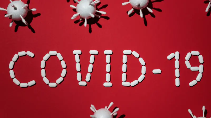 covid 19 sign and virus cells