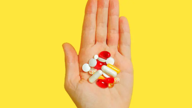 palm of hand with pills palm of hand with pills