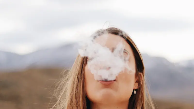 vapor obscures girl's face