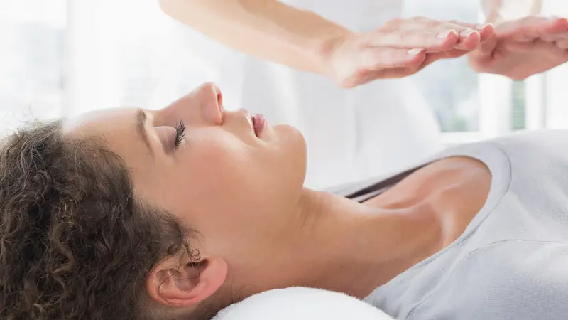 woman receives Reiki woman receives Reiki