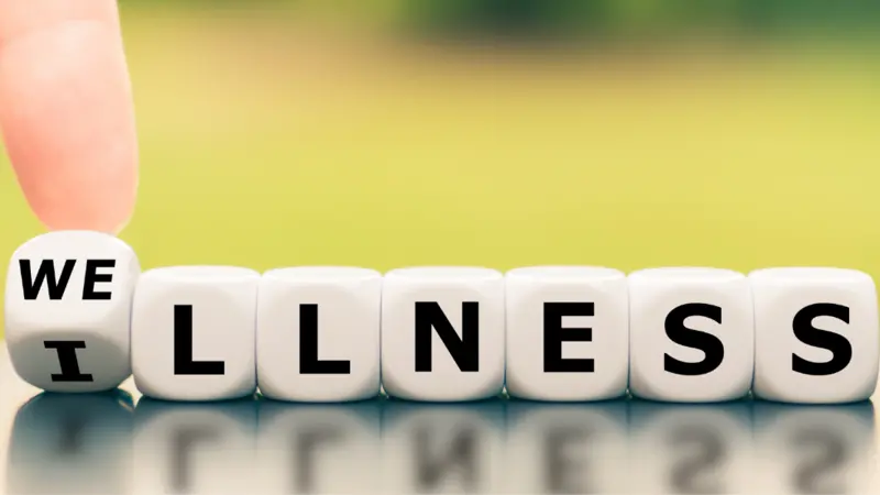 tiles spell out wellness or illness