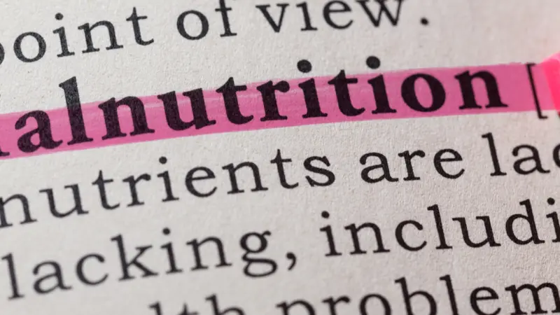Dictionary definition of the word malnutrition. including key descriptive words.