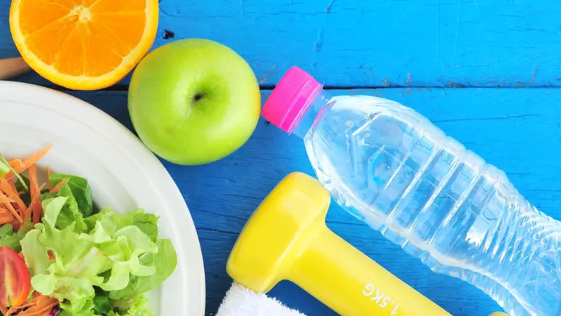 Fresh salad, fruits with sport and diet concept. Fresh salad, fruits with sport and diet concept.