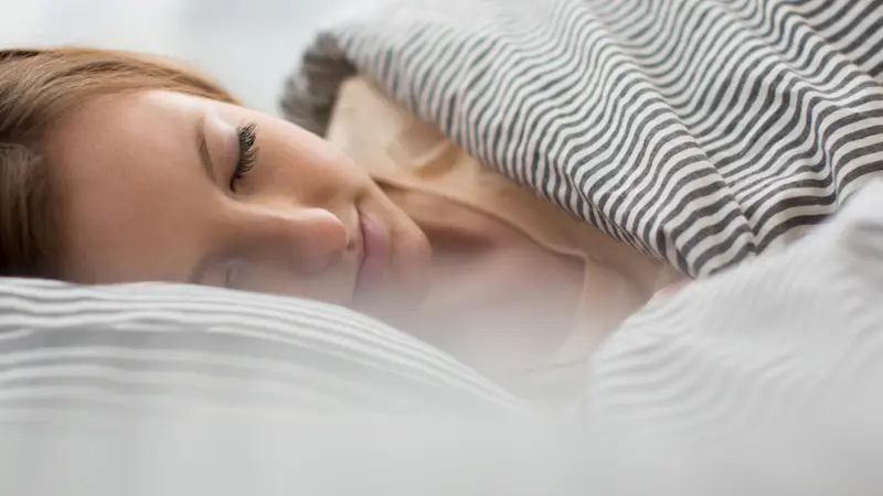 woman sleeping in bed