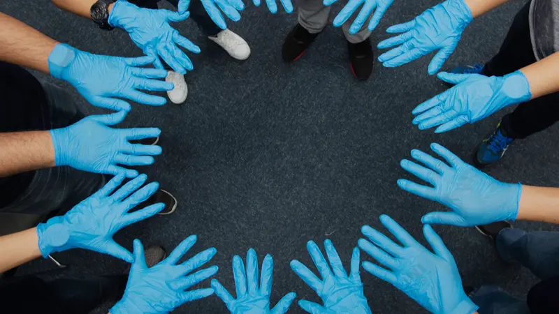Close up group of hand with medical glove present Collaborate