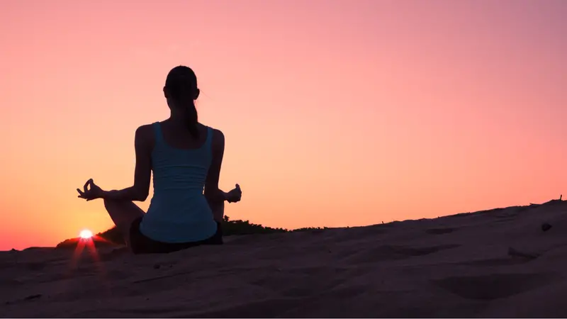 Relaxing yoga on the beach