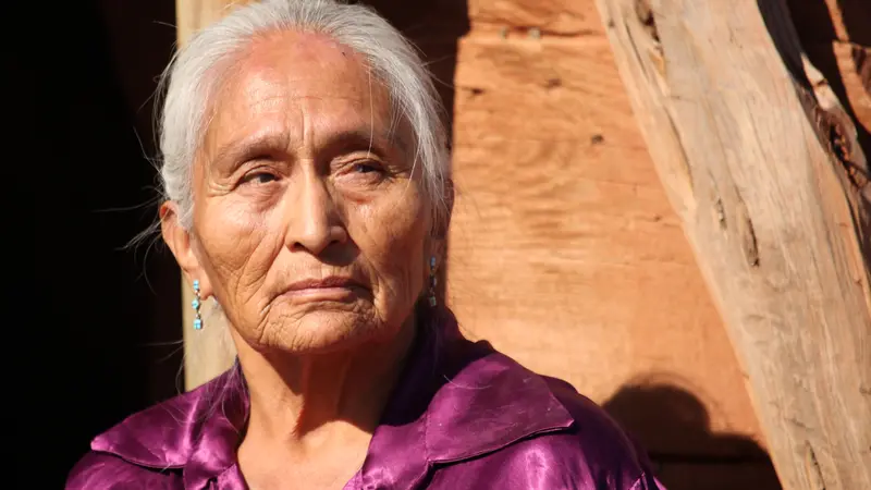 Elderly Navajo Woman Outside in Bright Sun Elderly Navajo Woman Outside in Bright Sun