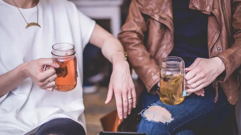 Monthly Gathering two people having a drink