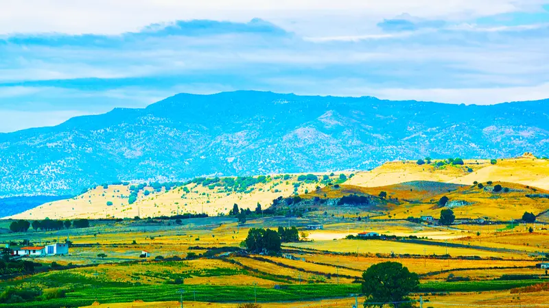 Agricultural fields in Nuoro at Mount Ortobene. Panorama and landscape in Sardinia island of Italy. Scenery of Sardegna in summer. 