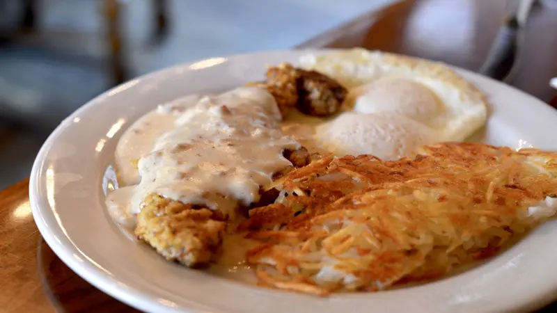 Country Fried Steak breakfast with eggs and hash browns