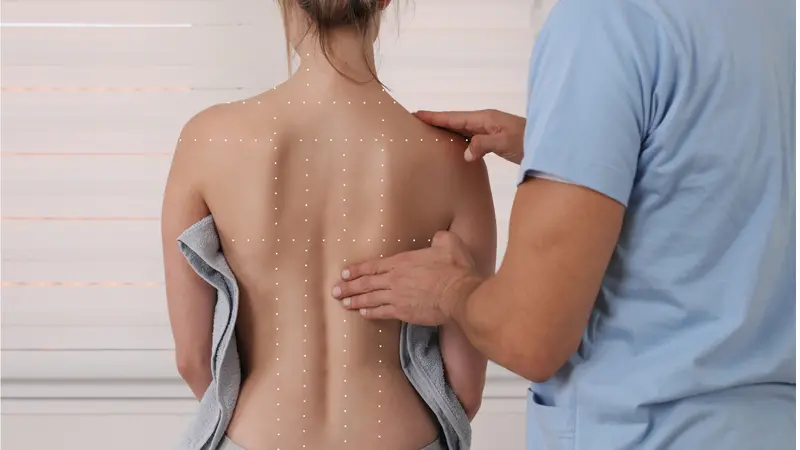 Chiropractic treatment; Back pain relief for female patient Chiropractic treatment; Back pain relief for female patient