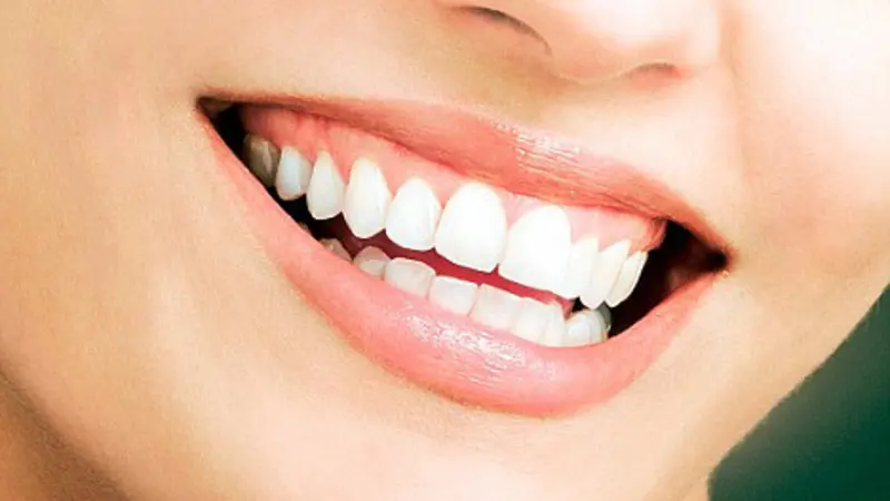 Mouth Elements that Trigger Whole Body Health or Disease - Holistic Moms Network Montgomery County, MD Chapter Woman smiling