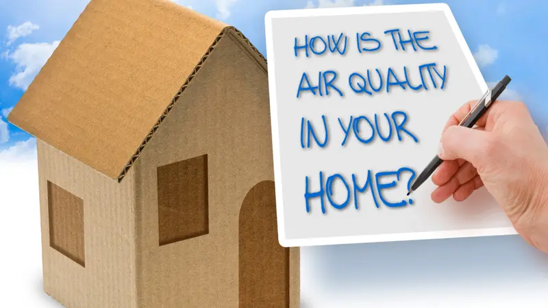 HOW IS THE AIR QUALITY IN YOUR HOME? - concept with a cardboard house HOW IS THE AIR QUALITY IN YOUR HOME? - concept with a cardboard house