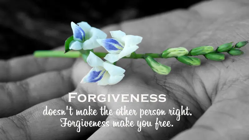 Inspirational quote - Forgiveness, does not make the other person right. Forgiveness make you free. With white flower plant in hand on black and white abstract art background. Inspirational quote - Forgiveness, does not make the other person right. Forgiveness make you free. With white flower plant in hand on black and white abstract art background.