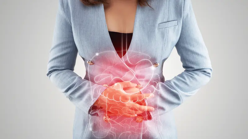 Business Woman touching stomach painful suffering from IBS
