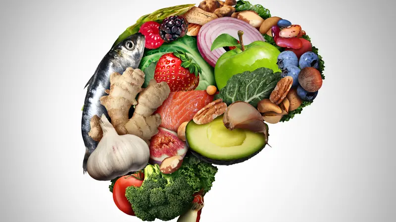 Healthy brain food to improve mental health concept - nutritious nuts fish vegetables and berries rich in omega-3 fatty acids, vitamins, minerals