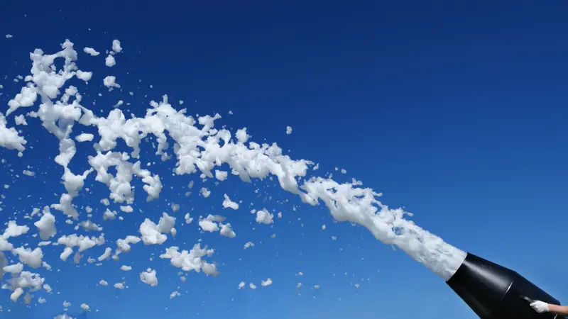 A foam cannon against the blue sky.