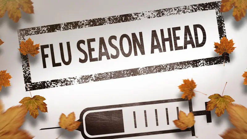 Autumn leaves pattern against white background with FLU SEASON AHEAD Autumn leaves pattern against white background with FLU SEASON AHEAD
