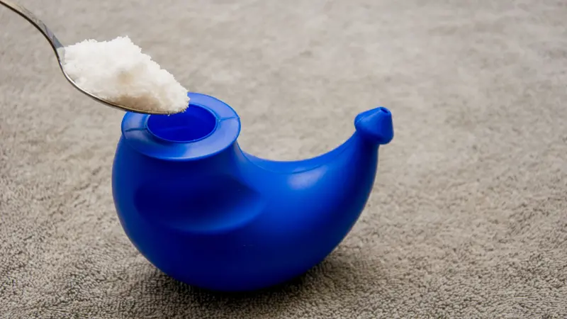 Neti pot and salt for nasal irrigation Neti pot and salt for nasal irrigation