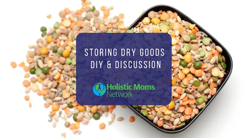 Storing Dry Goods DIY and Discussion Lentils both in a bowl and next to the bowl in a pile. Title reads: Storing Dry Goods and DIY Discussion. Holistic Moms Network