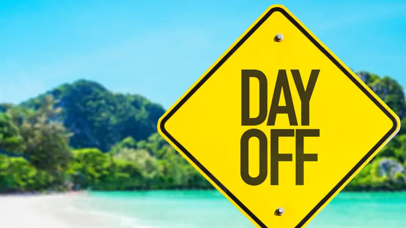 Day Off sign with beach background