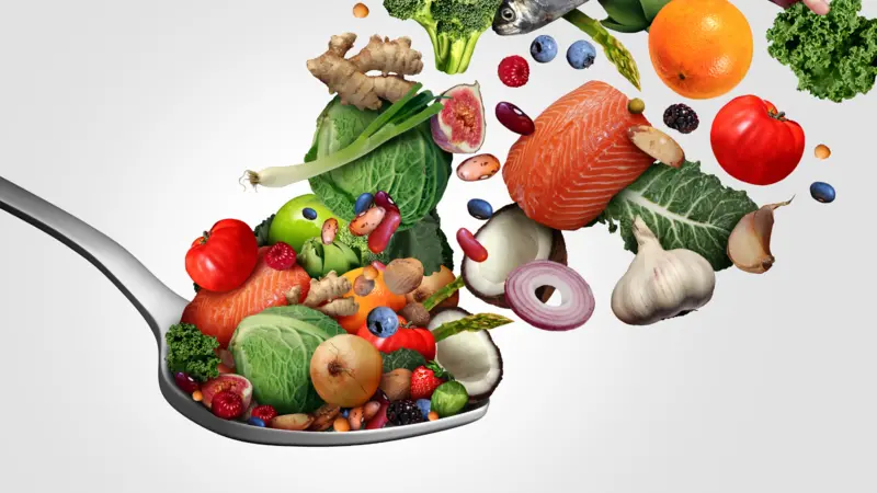 Cooling the Fire Within: Healthy Eating Tips to Ease Chronic Inflammation healthy foods on top of spoon