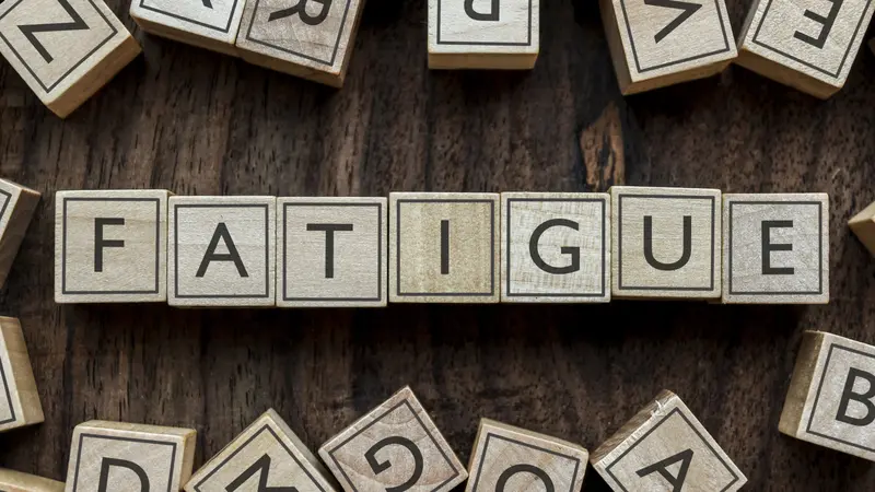 the word of FATIGUE on building blocks concept the word of FATIGUE on building blocks concept