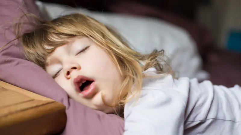 Child sleeping with an open mouth Child sleeping with an open mouth