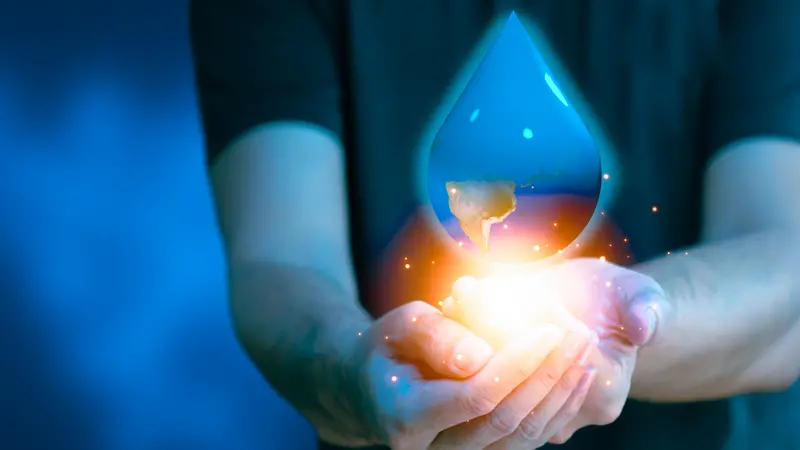 Holding the world in the shape of a drop of water Holding the world in the shape of a drop of water