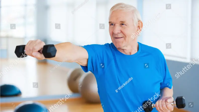 senior man exercising with dumbbells 