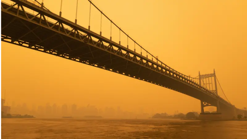 The Triborough Bridge along the East River in New York City with Massive Air Pollution from Wildfires