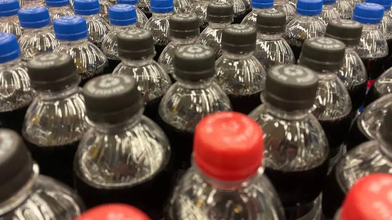 Soda tops display of cola Soda tops display of cola