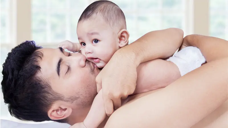 Father hugging baby