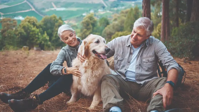 Mature couple with their dog