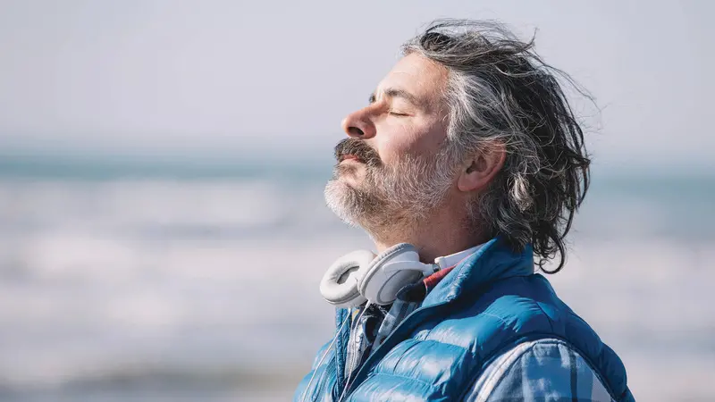 Man taking a deep breath Man taking a deep breath