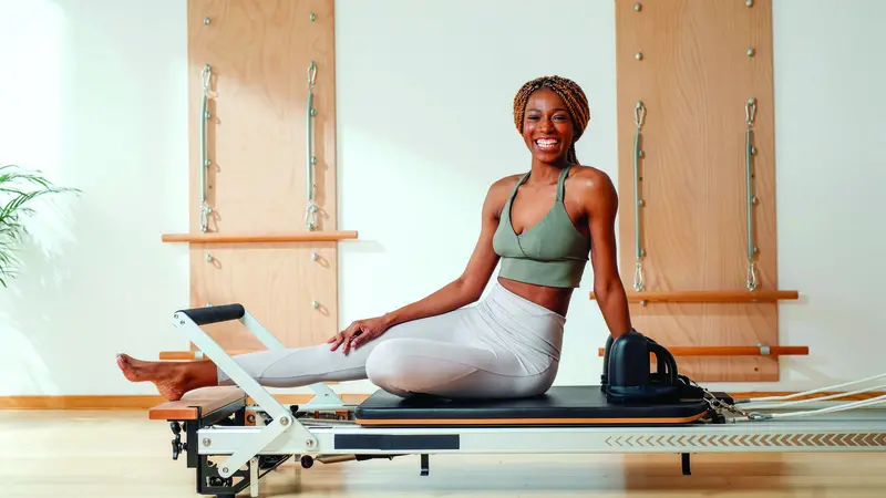 Women with Pilates Equipment Women with Pilates Equipment