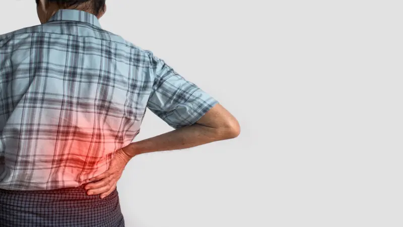 Asian elder man suffering from right sided low back pain. Asian elder man suffering from right sided low back pain.